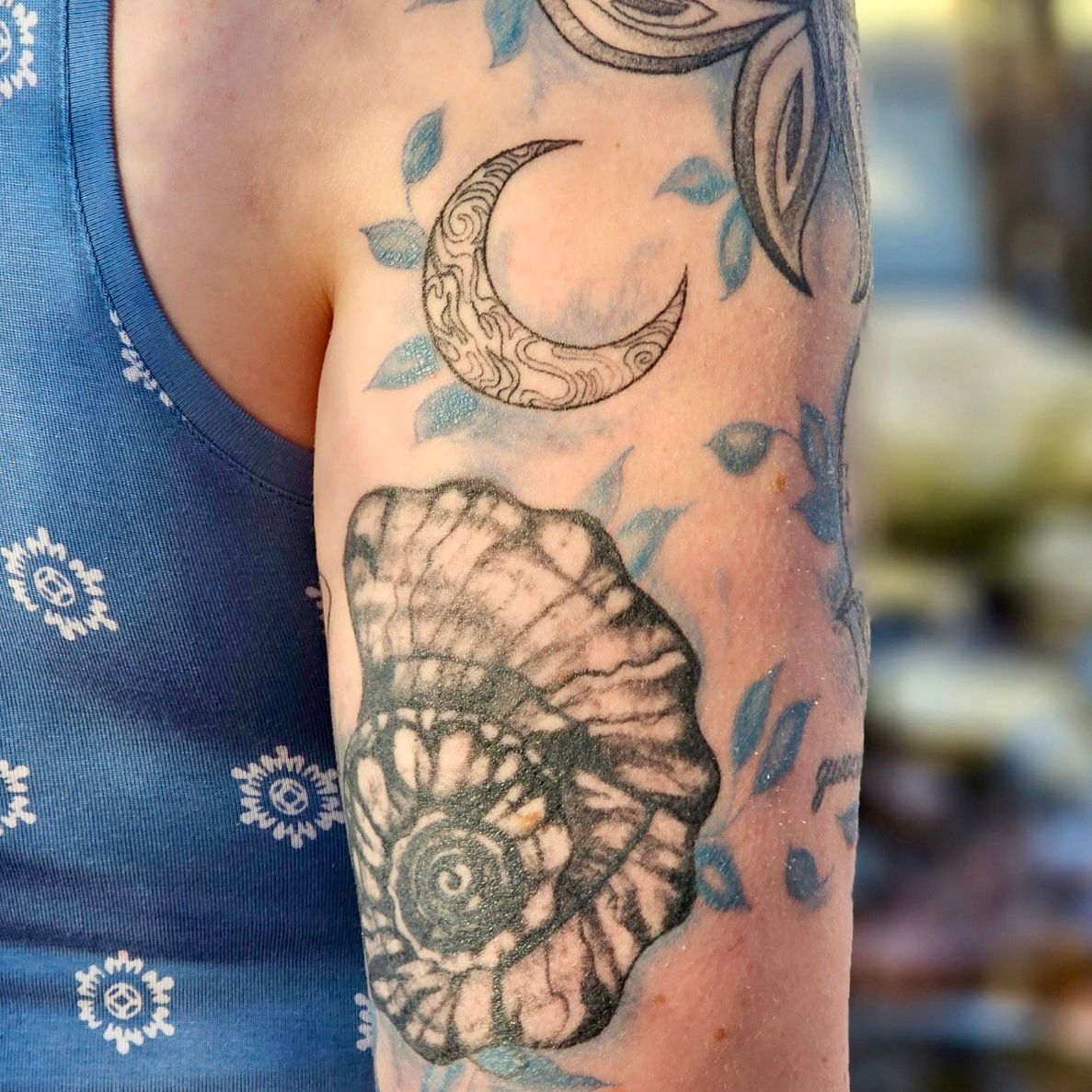 Embrace the Serenity of the Ocean with Seashell Tattoo Designs
