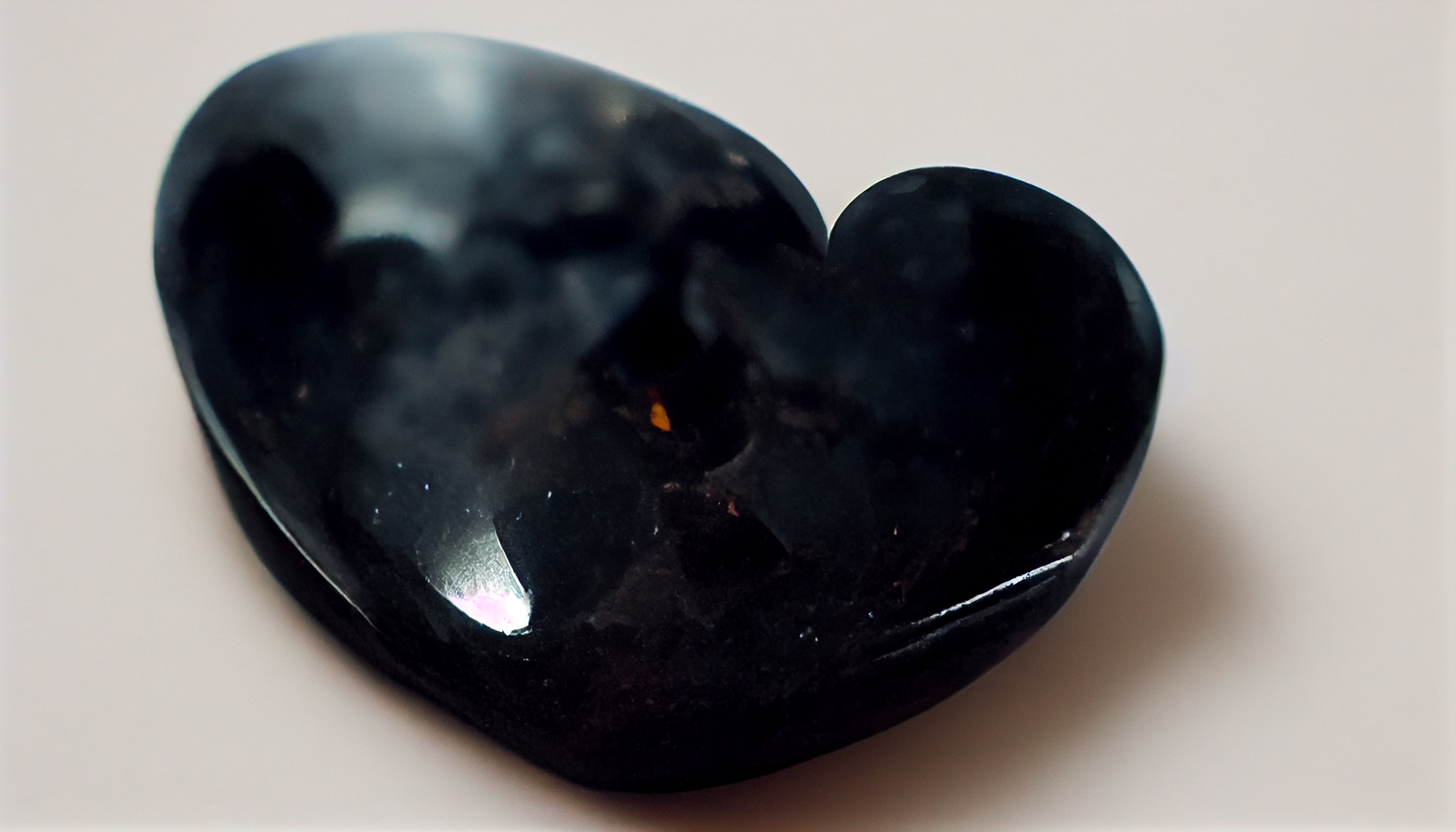 A black heart-shaped stone