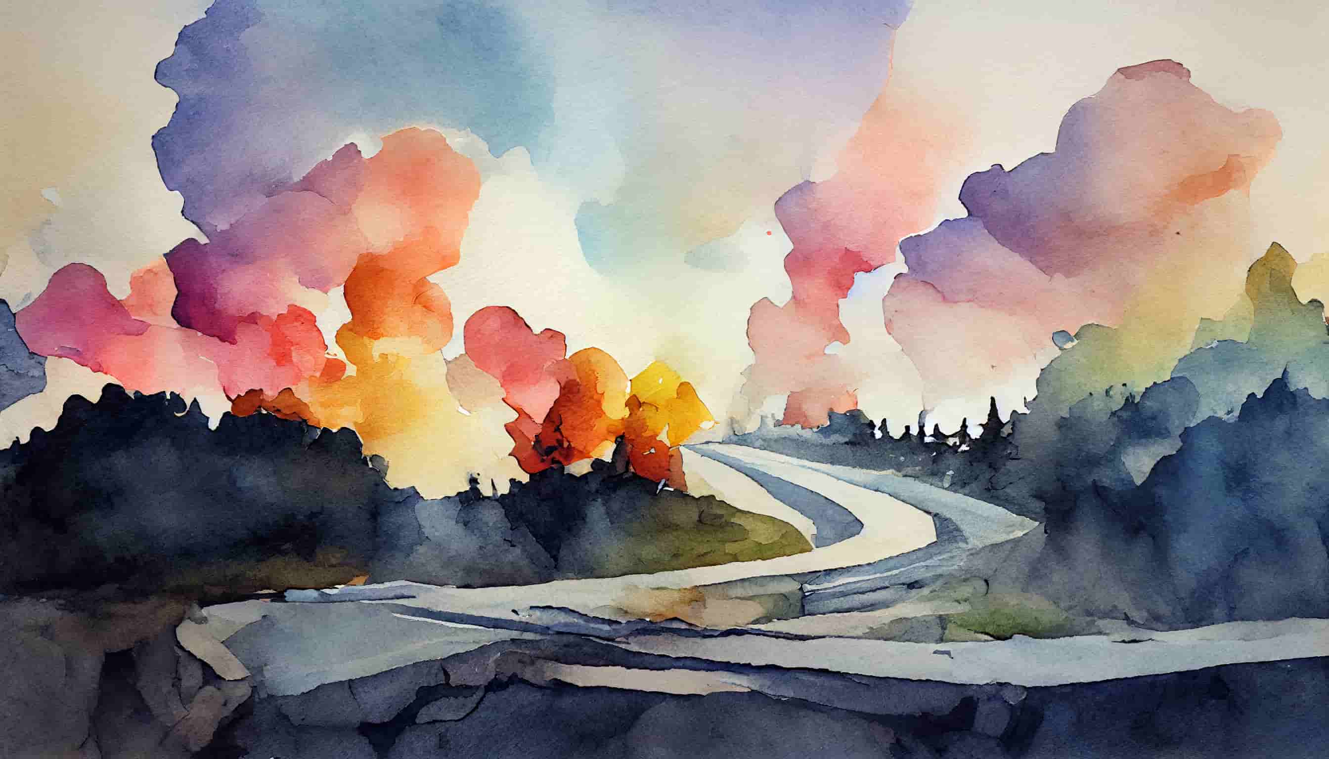 A road leading off in the distance with colorful clouds